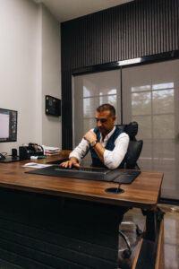 Luis Requejo analyzing payment statements to uncover hidden processing costs